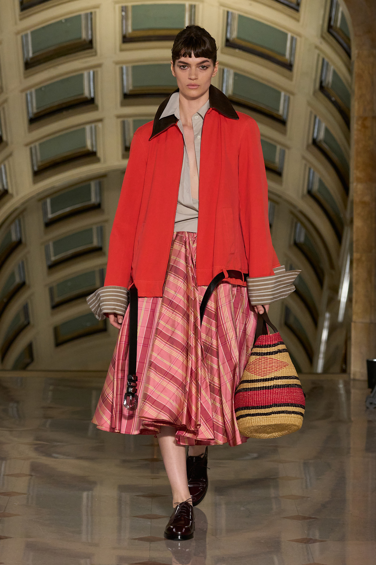 Altuzarra models wearing coats on the 2027 runway