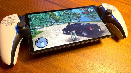 PlayStation Portal on wood surface with Grand Theft Auto: Liberty City Stories running 