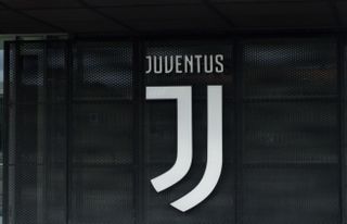 The Juventus badge on a wall at the club's stadium