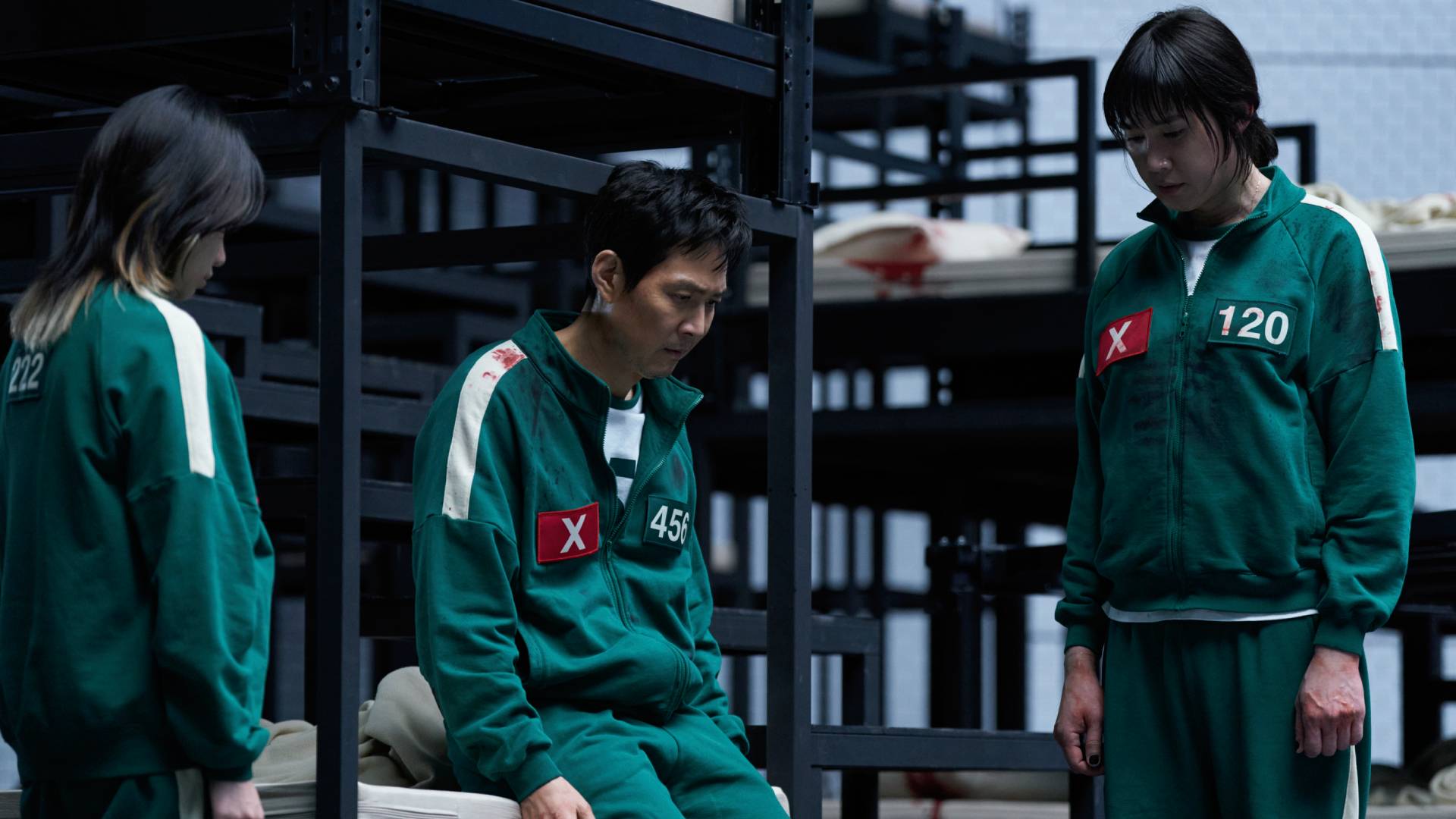Lee Jung-jae as Gi-hun, Yu-ri as Jun-hee, and Park Sung-hoon as Hyun-ju in Squid Game season 3