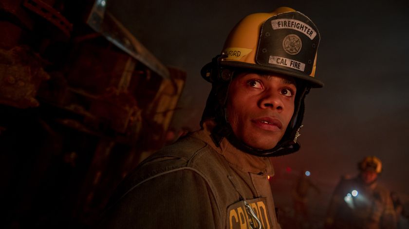 Jordan Calloway as Jake Crawford in fire fighting gear in Fire Country