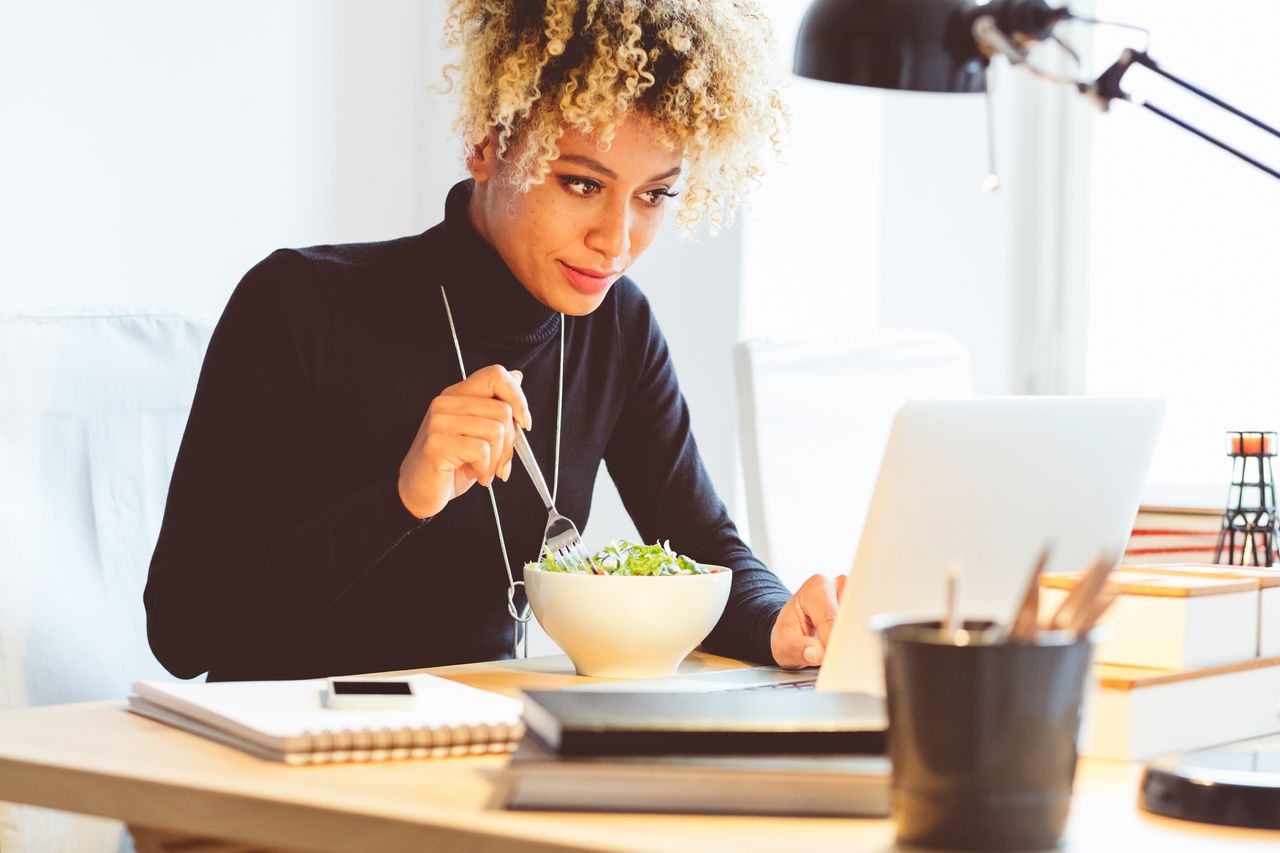 A woman eating.