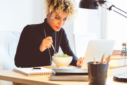 A woman eating.