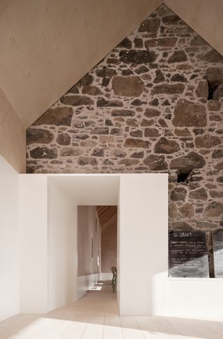 stone and white plaster walls at community dining hall, Croft 3 by London based studio fardaa