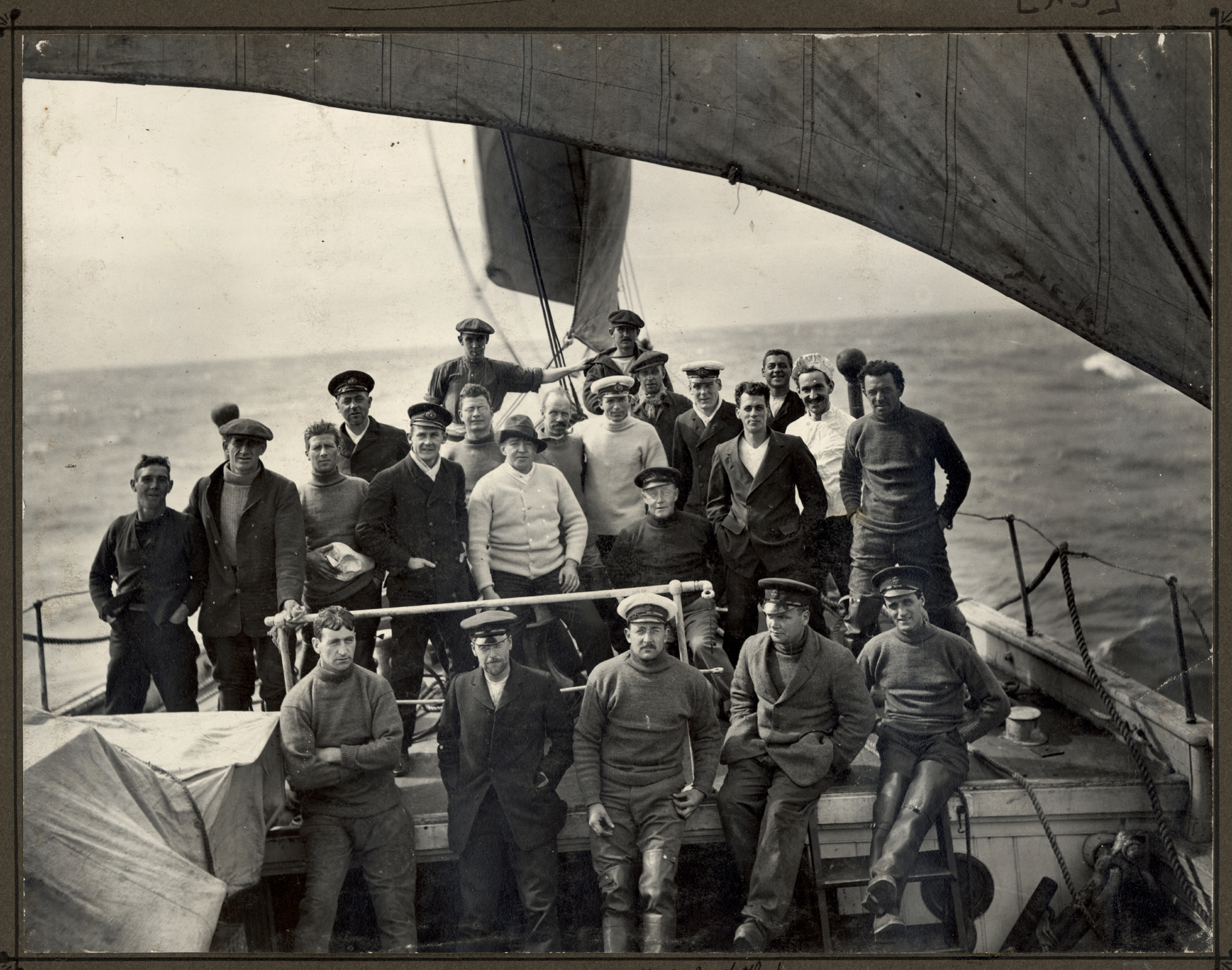 Explorers posing on the deck of the 'Endurance' during the Imperial Trans-Antarctic Expedition, 1914-17, led by Ernest Shackleton