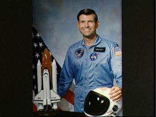 The official portrait of astronaut Michael L. Coats for the space shuttle Discovery's STS-41D mission.