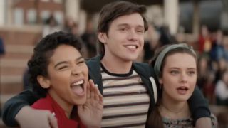 Abby, Simon, and Leah watching Nick play soccer in Love, Simon.