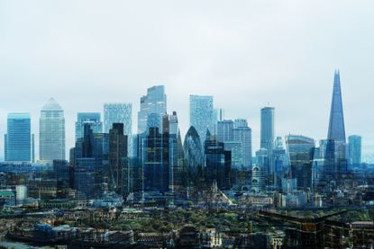 London buildings from the financial districts. Including The City of London financial district representing the FTSE 100 and dividend payments