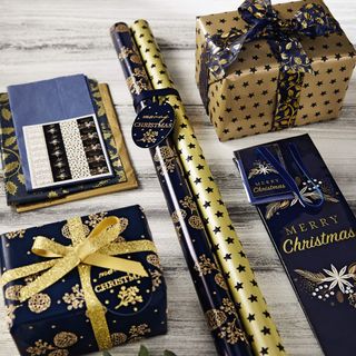 blue and golden gift wrap christmas gift and cards