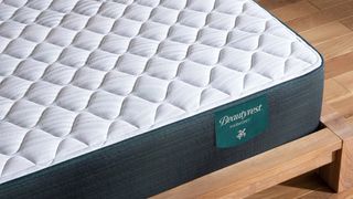 Image shows a corner of Beautyrest Harmony Mattress and the eco-friendly cover made with 30 to 50 plastic bottles saved from being dumped in the ocean