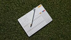 A scorecard on grass