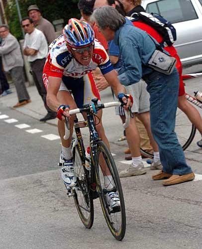 Giving it his all. Rik Verbrugghe grits his teeth and puts in the big ones near the end of stage 7