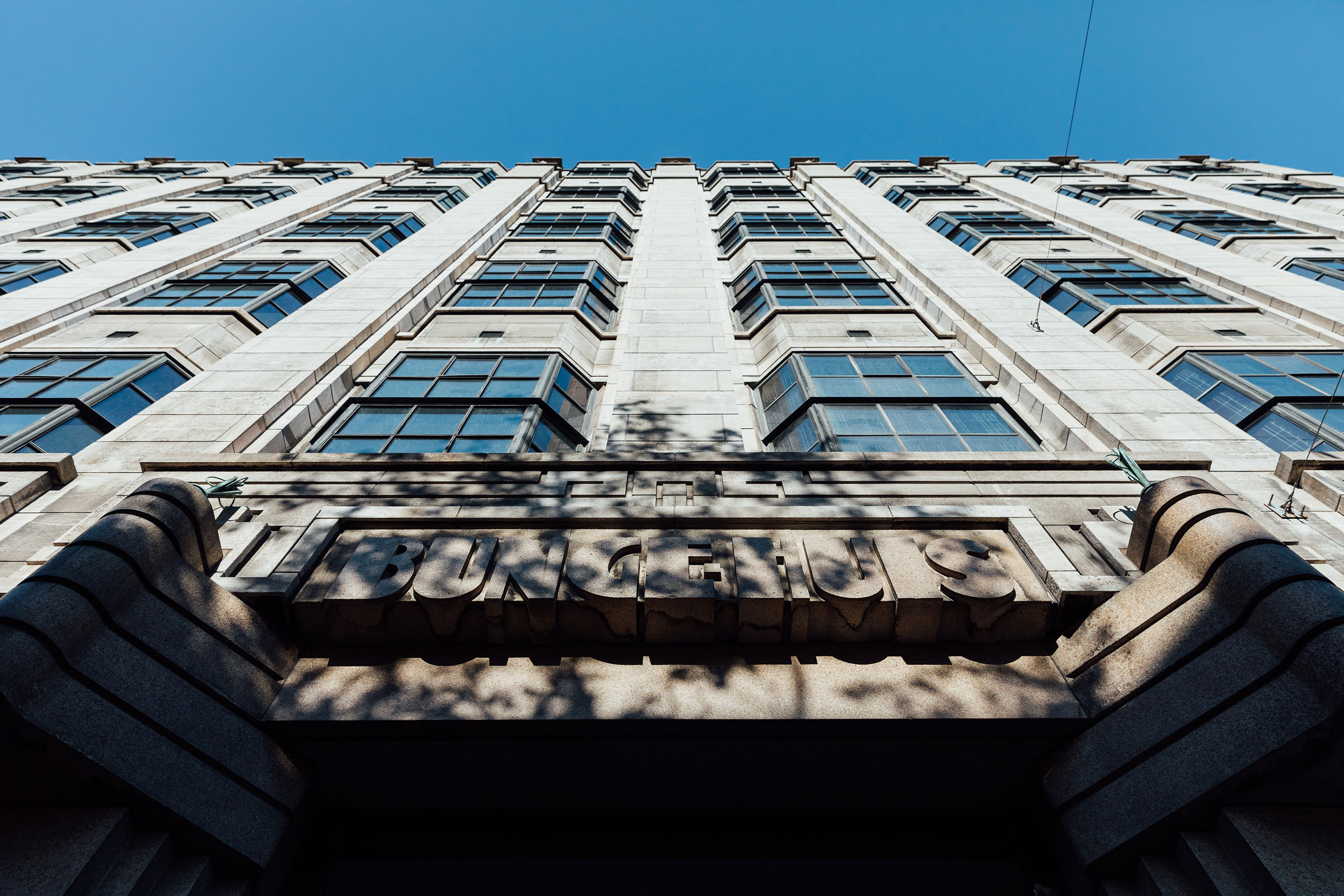 The imposing facade of the Bungehuis with its bronze-framed windows