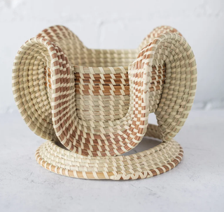 A woven abstract stand