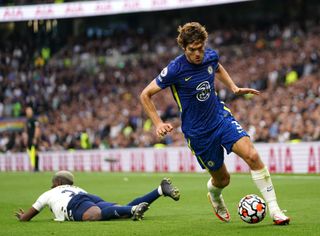Chelsea’s Marcos Alonso (right) skips over Tottenham Hotspur’s Tanguy Ndombele during the Premier League match at the Tottenham Hotspur Stadium, London. Picture date: Sunday September 19, 2021