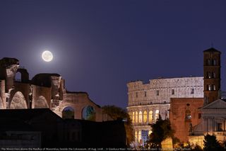 The moon rising behind the Basilica of Maxentius, near the Colosseum, on Aug. 28, 2018.