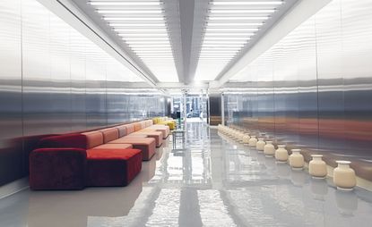 The futuristic entrance features a colossal Rope modular sofa