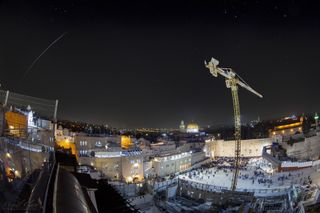 The International Space Station crosses the sky above the Old City of Jerusalem.