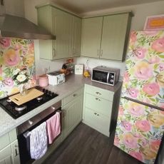 green kitchen makeover with floral wallpaper