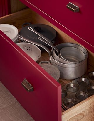 Pans stored in kitchen drawer