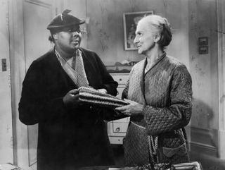 a younger woman and an elderly woman stand in a small apartment together in the movie Make way for tomorrow