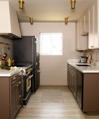 A full view of a brown and neutral kitchen design