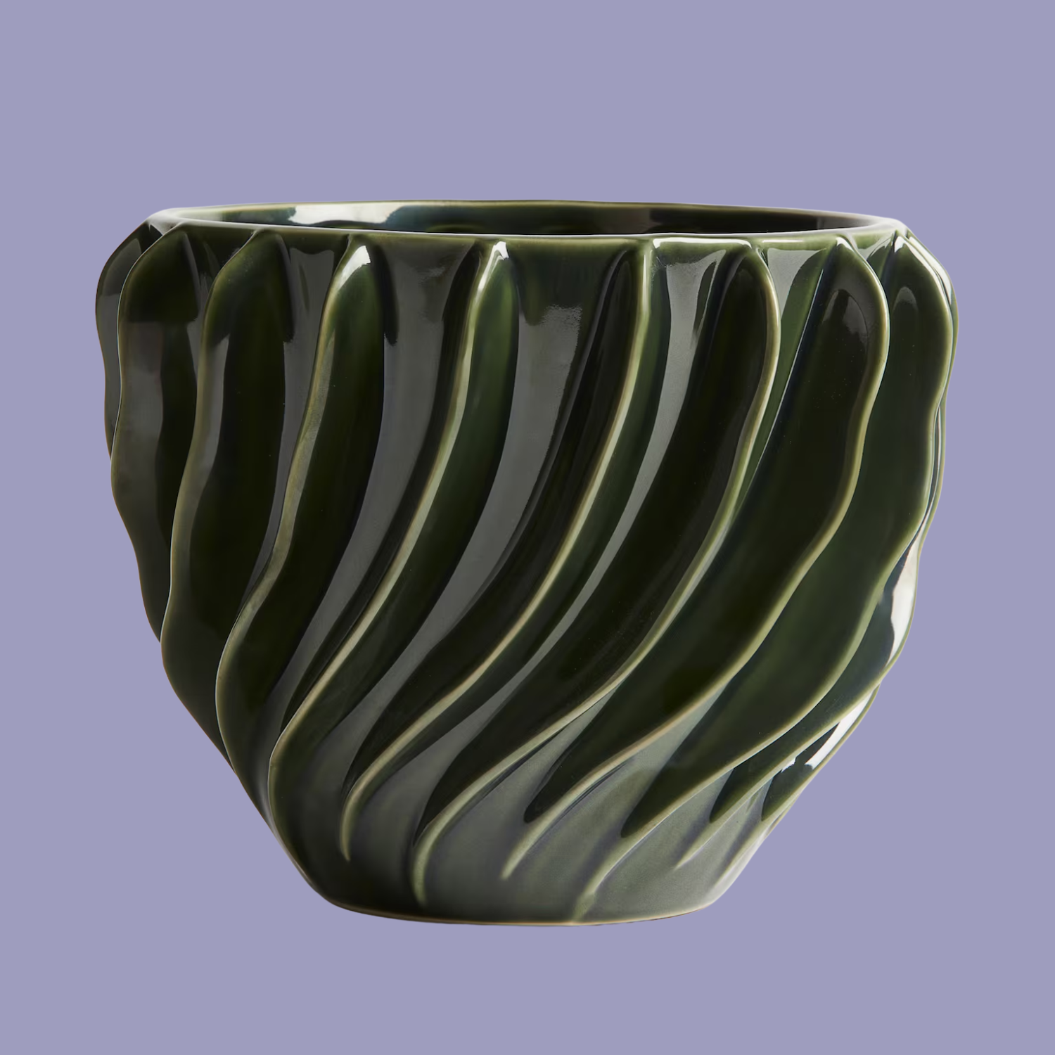 A large textured green stone plant pot