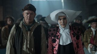Hugh Bonneville in a cap and ragged shirt as Jonathan Wilde and Noel Fielding in a white wimple and red jacket as Dick Turpin in The Completely Made-Up Adventures of Dick Turpin.