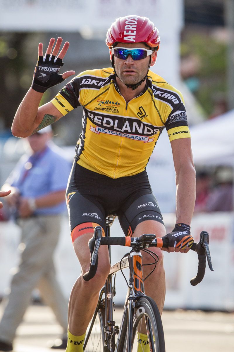 Phil Gaimon (Optum) rolls in after crashing with a few laps to go