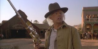 Back to the Future Part III Doc Brown holding his rifle