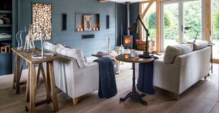 grey living room in a barn conversion with furniture to show how to make a home cosy