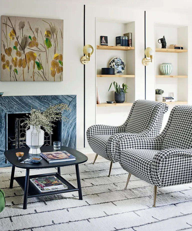 living room with armchairs and coffee table