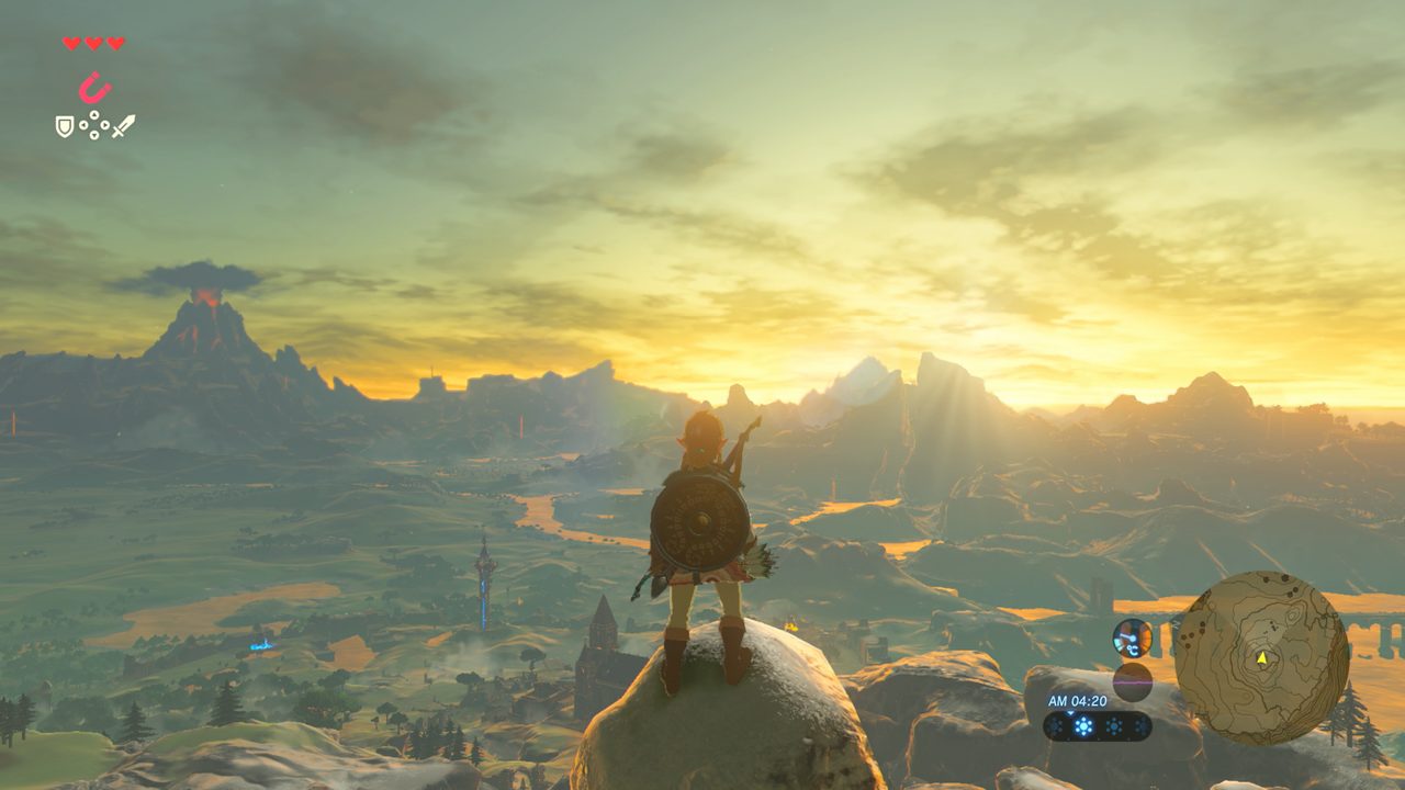Screenshot from Breath of the Wild showing Link standing on a tall peak.