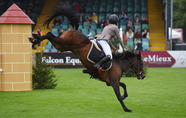 BUTTONS TWO, ridden by Shaunie Greig in The Winter 138cms Championship during The Longines Royal International Horse Show (CSIO 5*) held at The All England Jumping Course at Hickstead in West Sussex in the UK between 25 - 30th July 2017