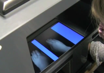Setup of the disappearing hand trick illusion.