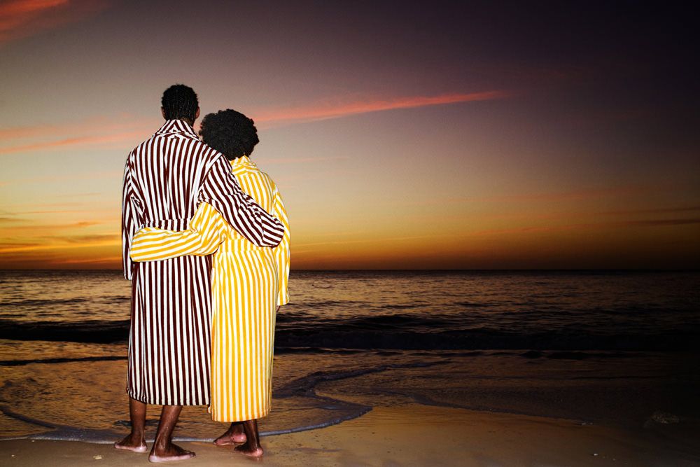 A resort-inspired home and loungewear collection features bright tones of yellow inspired by summer's warmth, wooden notes, and a stripy essence.
