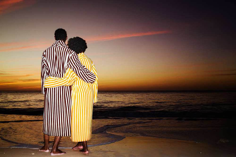 A resort-inspired home and loungewear collection features bright tones of yellow inspired by summer's warmth, wooden notes, and a stripy essence.