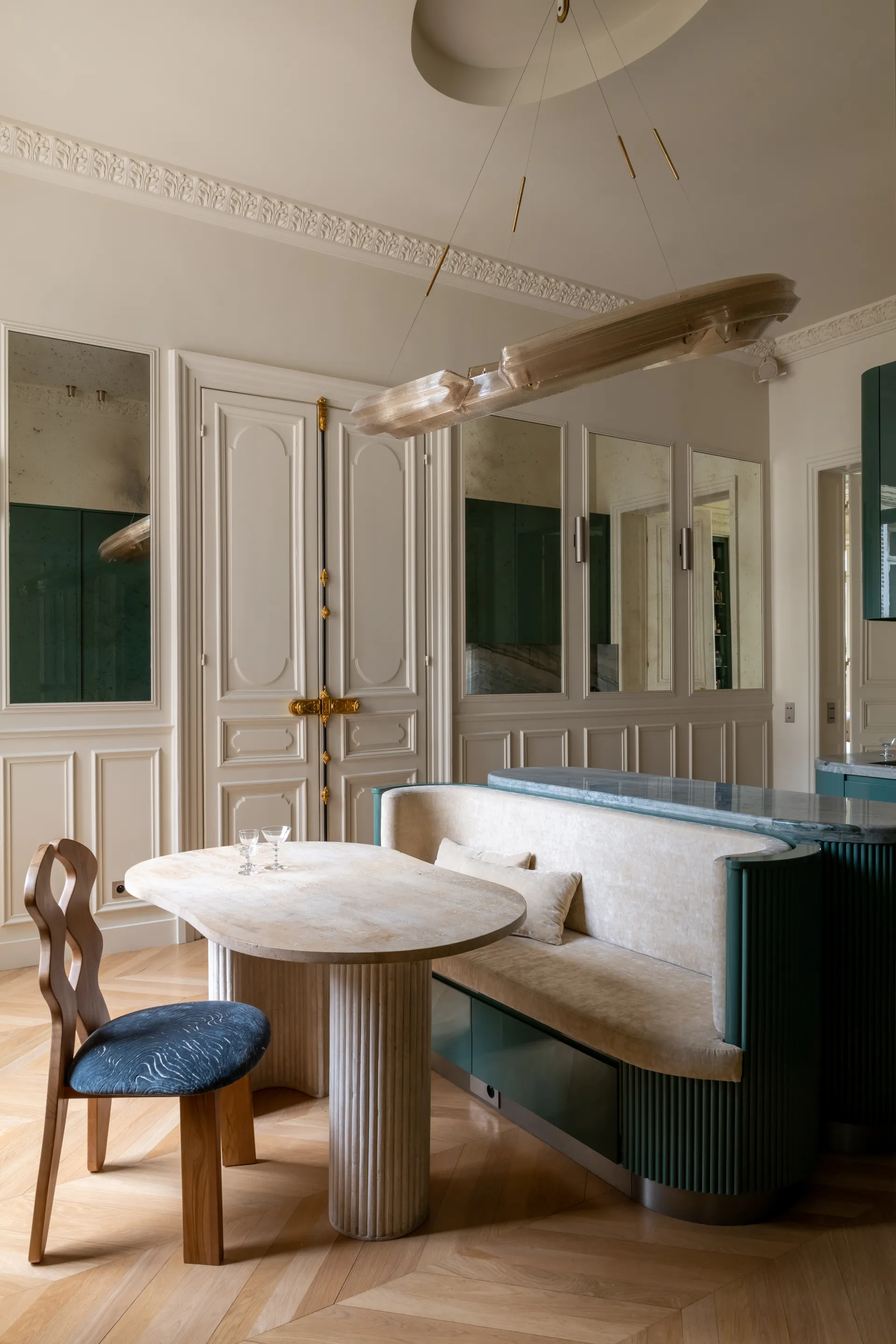 Dining room with marble table and tapestry