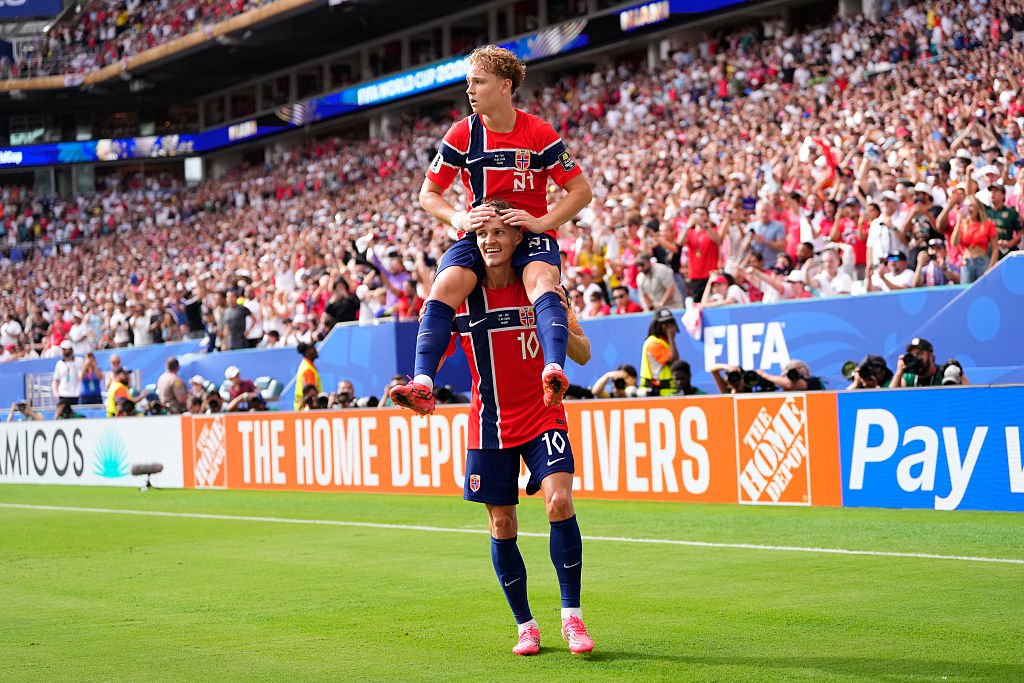 Andreas Schjelderup celebrates with teammate Martin Odegaard by sitting on his shoulders. (Photo by Jose Breton/Pics Action/NurPhoto via Getty Images)