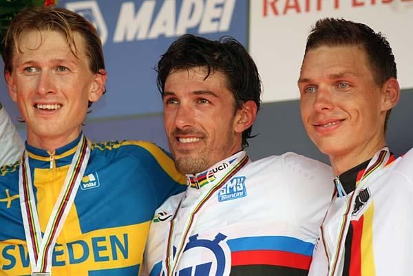 Fabian Cancellara on the podium with Gustav Larsson and Tony Martin