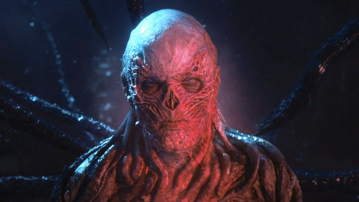 Vecna stares directly into the camera with a menacingly look on his face in Stranger Things season 4