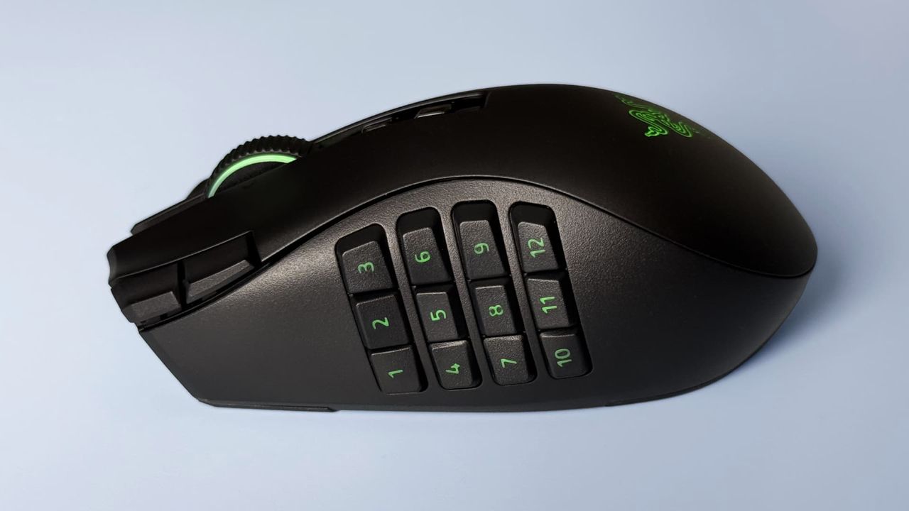 The Razer Naga V3 Pro mouse against a blue background.