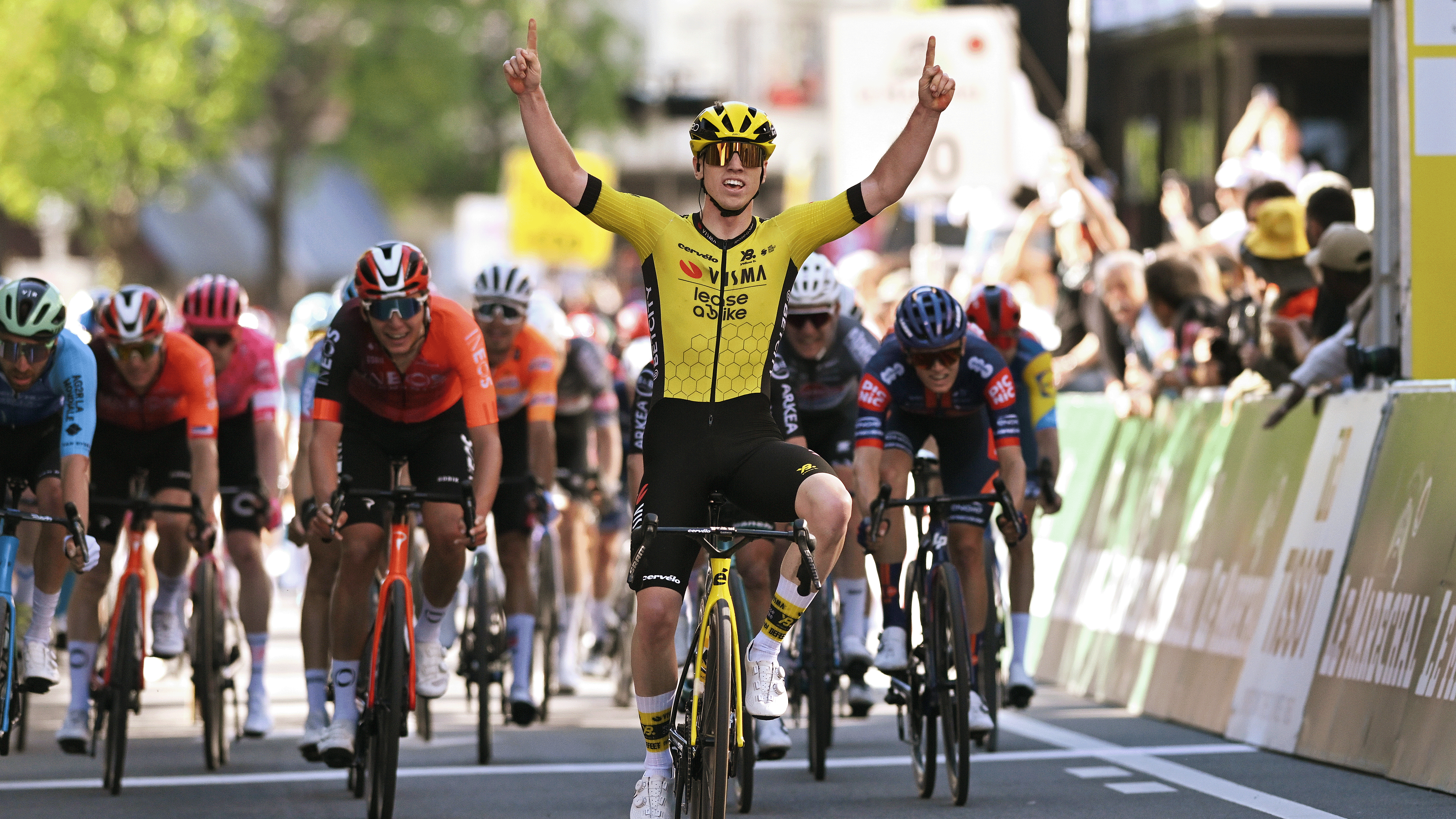 FRIBOURG, SWITZERLAND - APRIL 30: Matthew Brennan of Great Britain and Team Visma | Lease A Bike celebrates at finish line as stage winner during the 78th Tour De Romandie 2025, Stage 1 a 194.3km stage from Munchenstein to Fribourg / #UCIWT / on April 30, 2025 in Fribourg, Switzerland. (Photo by Dario Belingheri/Getty Images)