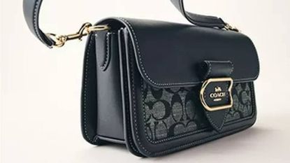 A black handbag from Coach Outlet