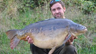 Where to fish for big carp - Ben Hervey-Murray holding a very big carp