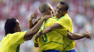 Ronaldinho, Ronaldo and Rivaldo celebrate a Brazil goal at the 2002 World Cup.