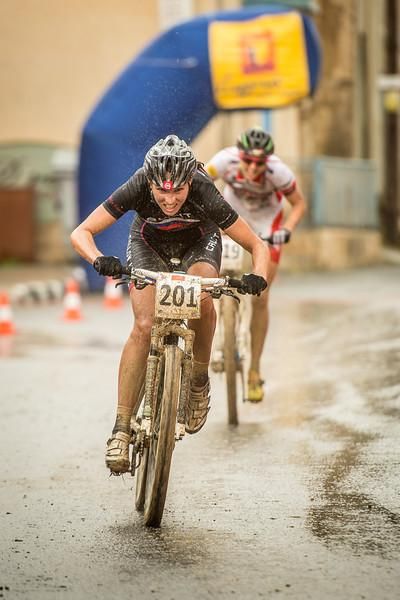 Katrin Leumann sprints after Blaza Klemencic