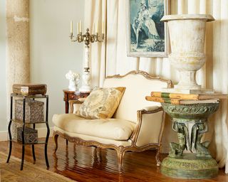 regency era style decor with sofa and ornaments
