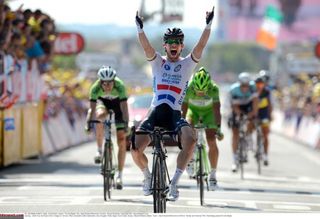 Mark Cavendish celebrates victory on one of the classic Tour de France stages