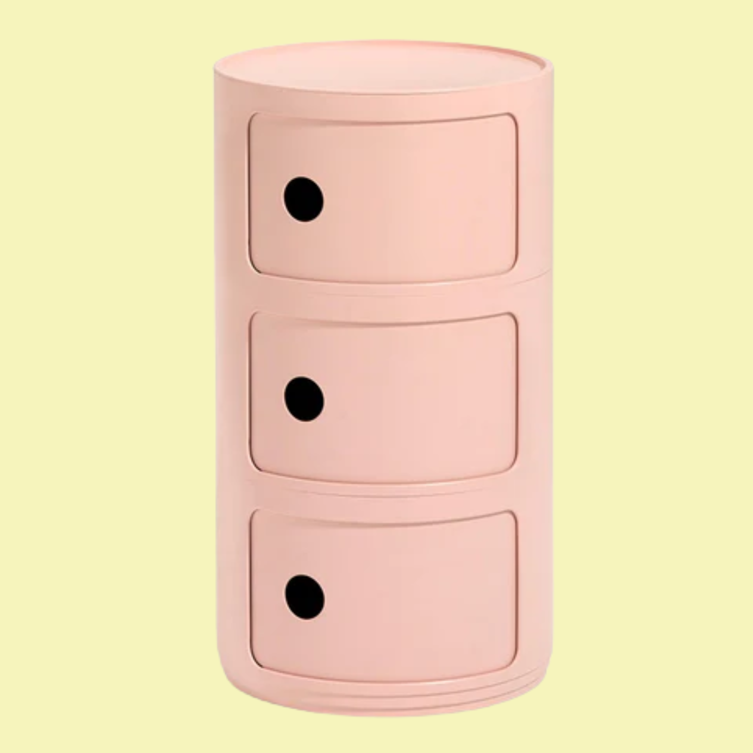 A pink cylindrical storage side table with three drawers